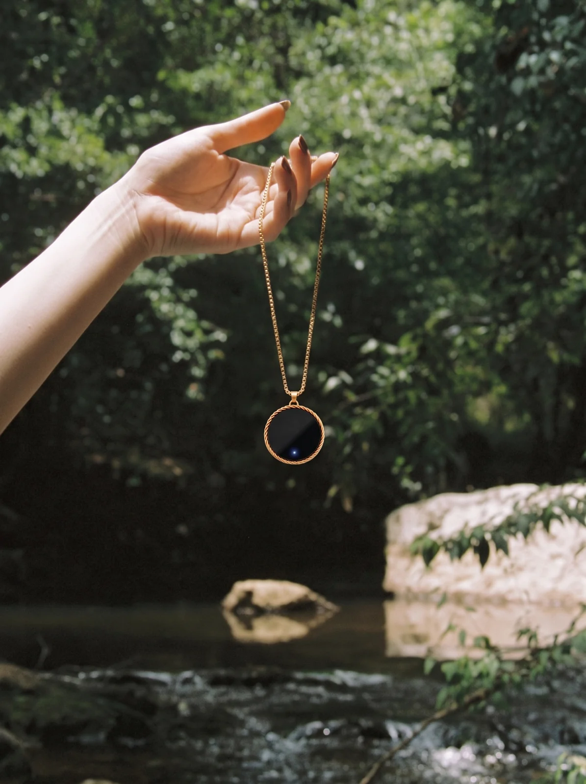 AF gold titanium pendant